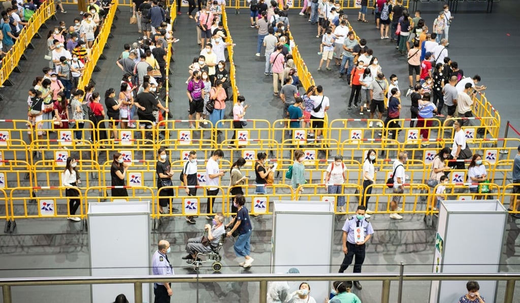 Residents of neighbouring Macau line up for coronavirus testing on Wednesday after the city confirmed its first infections in over a year. Photo: Xinhua Residents of neighbouring Macau line up for coronavirus testing on Wednesday after the city confirmed its first infections in over a year. Photo: Xinhua