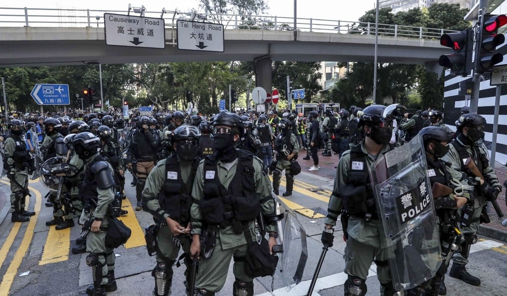 Riot police stand guard near Victoria Park on November 2, 2019, the day Chan Chun-kit was arrested while in possession of zip ties. Photo: Edmond So Riot police stand guard near Victoria Park on November 2, 2019, the day Chan Chun-kit was arrested while in possession of zip ties. Photo: Edmond So