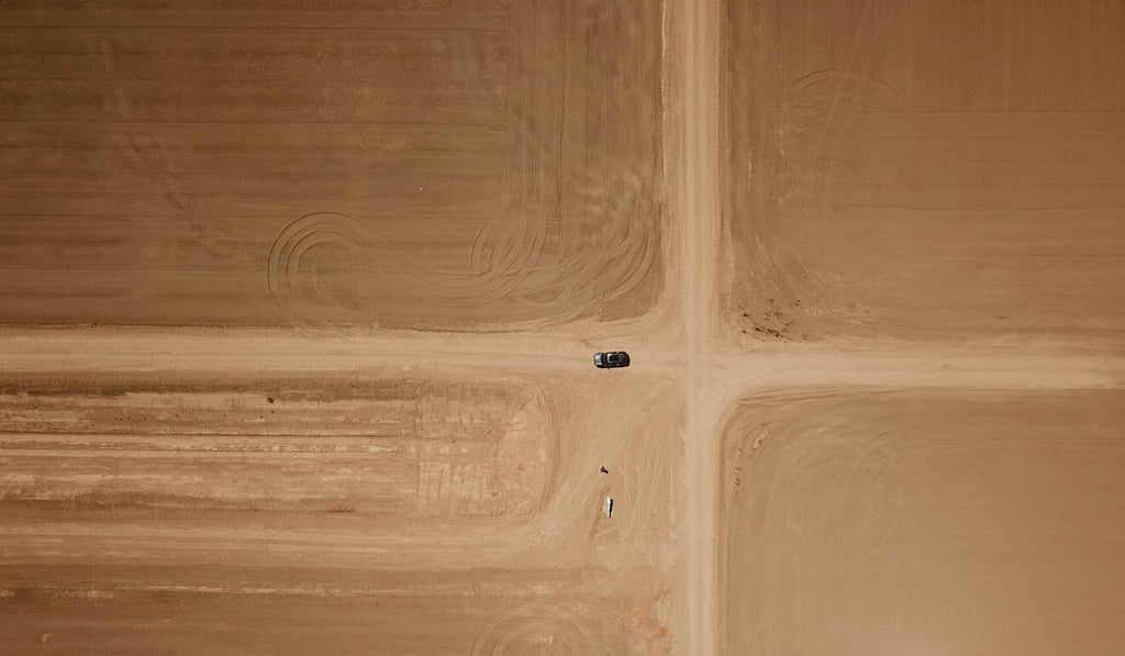 Barren fields once sown with crops are seen on a farm in California’s drought-stricken Central Valley. Photo: AFP
