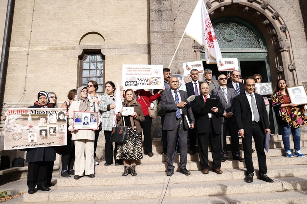MEK supporters gather outside court as the trial of Hamid Noury starts in Stockholm on August 10, 2021. Photo: EPA-EFE MEK supporters gather outside court as the trial of Hamid Noury starts in Stockholm on August 10, 2021. Photo: EPA-EFE