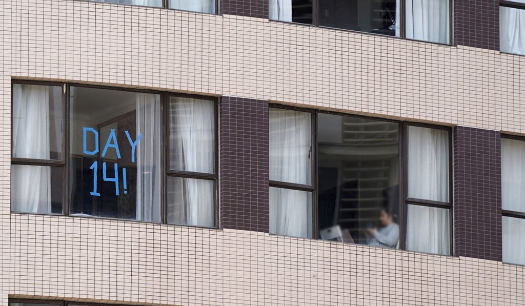 People isolating at the Dorsett Wanchai hotel, where a domestic helper is believed to have caught Covid-19 from a couple in another room. Photo: Sam Tsang