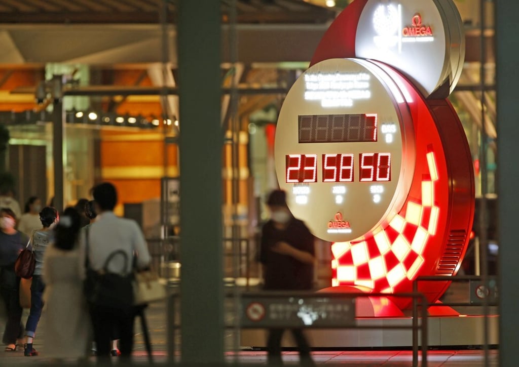 A countdown clock in front of JR Tokyo Station on Monday shows seven days before the opening ceremony of the Tokyo Paralympics. Photo: Kyodo
