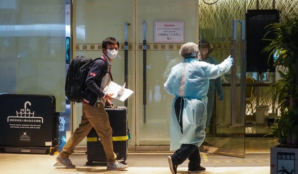 A man arrives at a designated quarantine hotel in Kowloon City. Photo: Sam Tsang