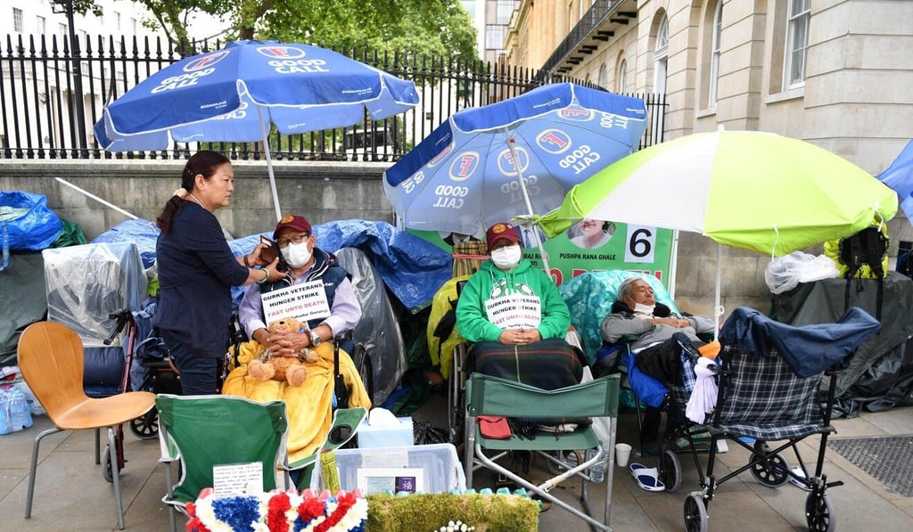 Dhan Gurung, Pushpa Rana Ghale and Gyanraj Rai continue their hunger strike outside 10 Downing Street. Photo: AFP Dhan Gurung, Pushpa Rana Ghale and Gyanraj Rai continue their hunger strike outside 10 Downing Street. Photo: AFP