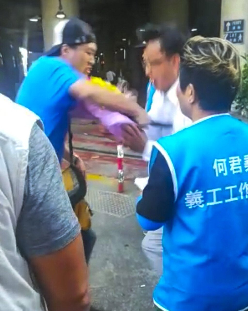 Tung Pak-fai pleaded guilty to wounding with intent, and wounding, in relation to the attack on Junius Ho (right) and his bodyguard. Photo: Handout