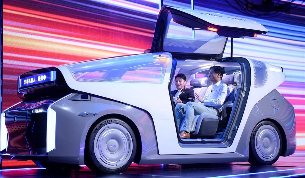 Baidu CEO Robin Li (right) unveils a robocar prototype at the annual Baidu World conference on Wednesday. Photo: Handout