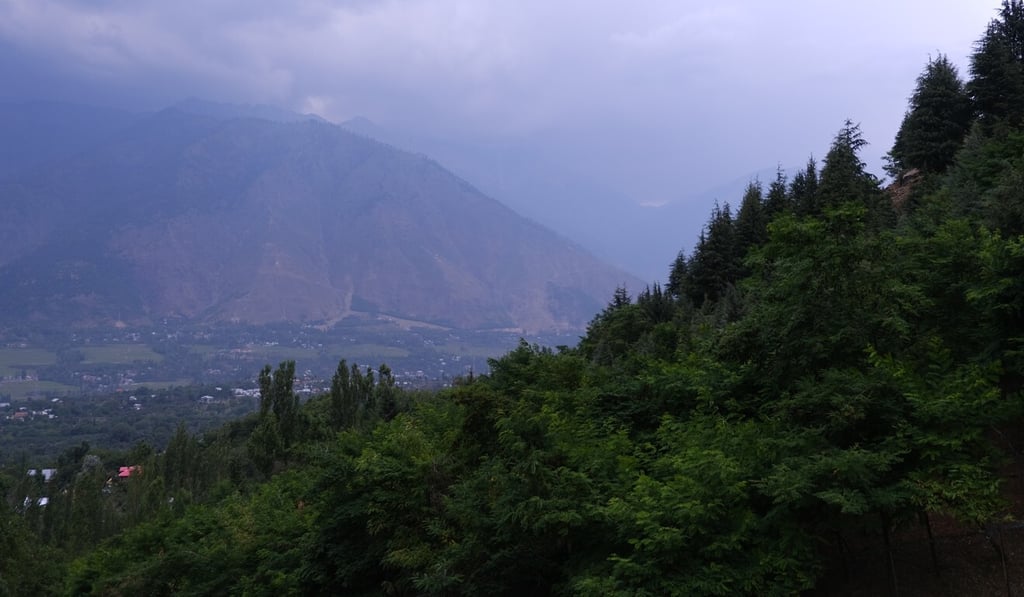 Baba Wayil is surrounded by mountains and lush green trees. Photo: Adil Amin Akhoon