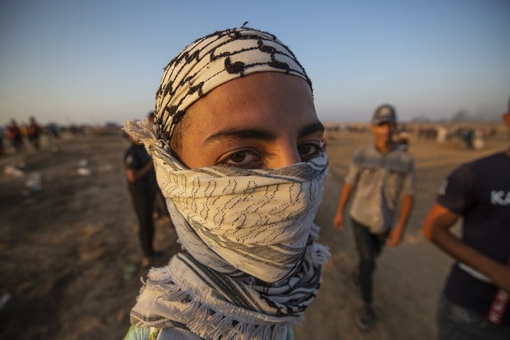 A Palestinian protester during clashes near the border between Israel and the Gaza Strip on Wednesday. Photo: EPA-EFE