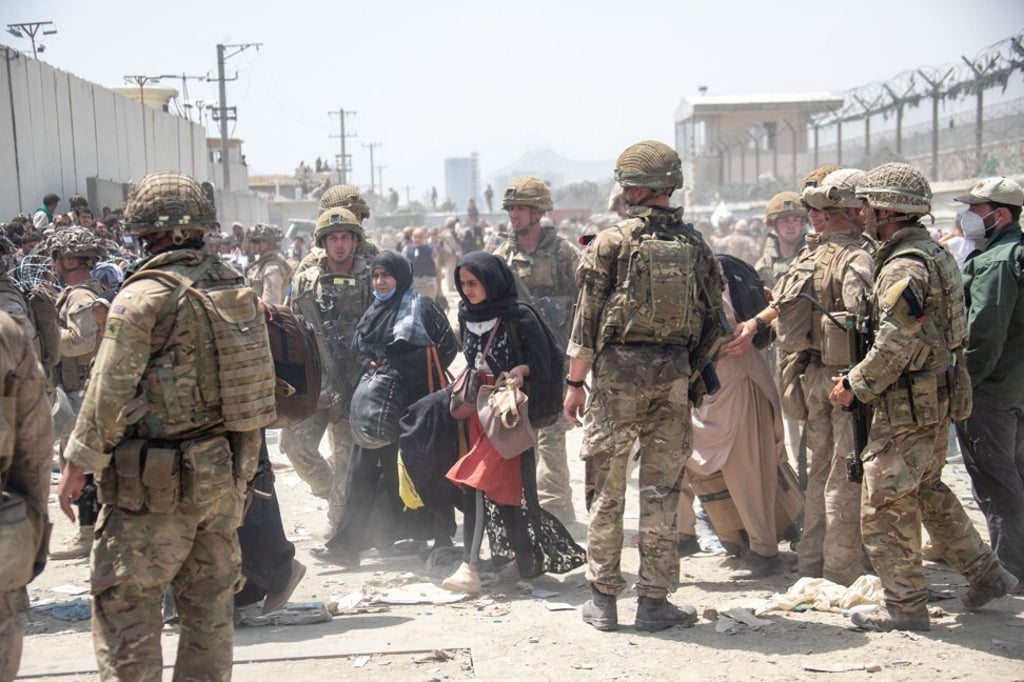 Members of the British and US armed forces work at Kabul Airport on Saturday. Photo: British Ministry of Defence/AFP Members of the British and US armed forces work at Kabul Airport on Saturday. Photo: British Ministry of Defence/AFP