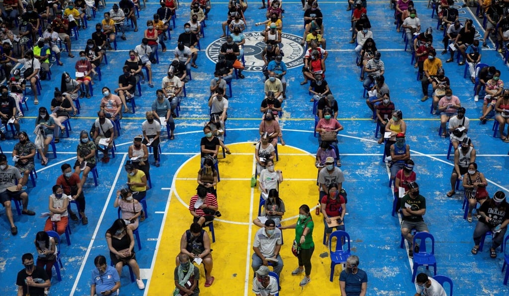 Covid-19 vaccine records for helpers from the Philippines will be accepted. Photo: Reuters Covid-19 vaccine records for helpers from the Philippines will be accepted. Photo: Reuters