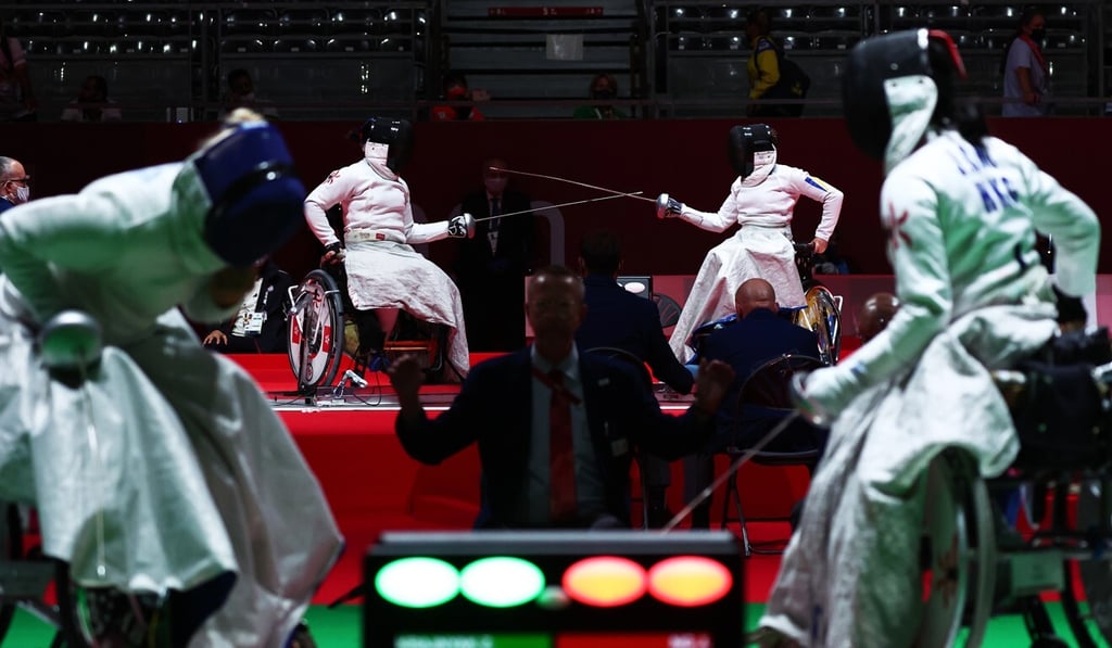 Hong Kong’s Yu (left) against Nataliia Mandryk of Ukraine in the women’s épée individual category A round of 16 at the Tokyo 2020 Paralympic Games in Japan. Photo: Reuters