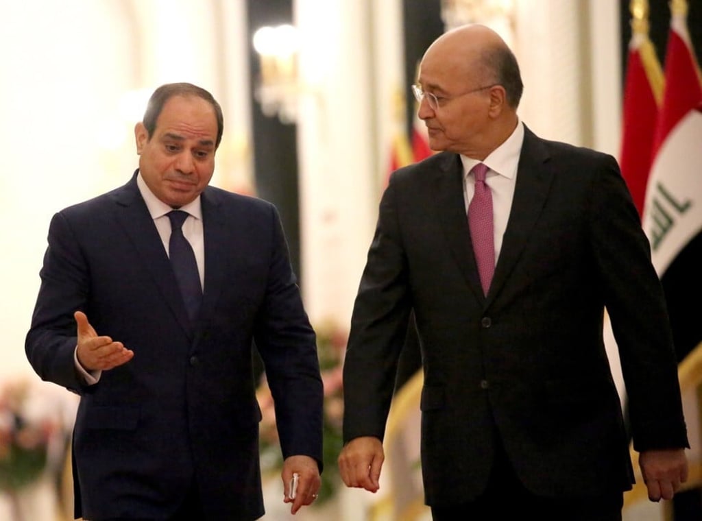 Iraqi President Barham Saleh, right, welcomes his Egyptian counterpart Abdel Fattah al-Sisi at the Iraqi presidential palace in Baghdad, Iraq on Saturday. Photo: EPA-EFE Iraqi President Barham Saleh, right, welcomes his Egyptian counterpart Abdel Fattah al-Sisi at the Iraqi presidential palace in Baghdad, Iraq on Saturday. Photo: EPA-EFE