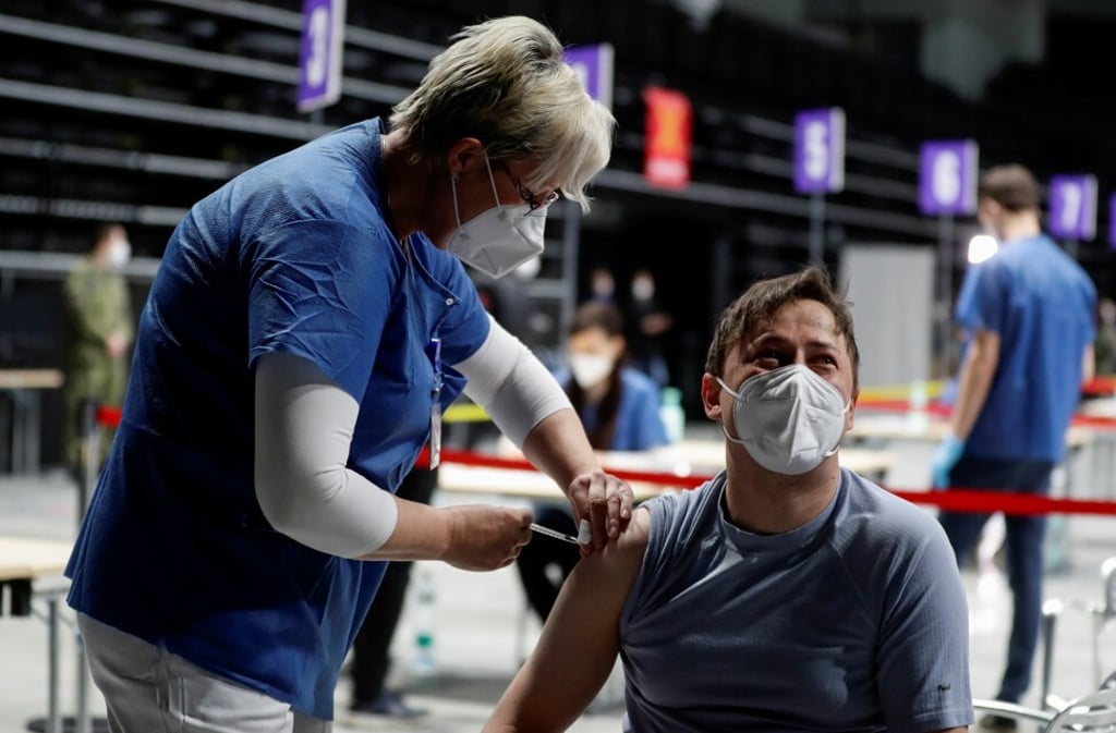 A man receives a Covid-19 vaccine dose in Prague, Czech Republic. Photo: Reuters