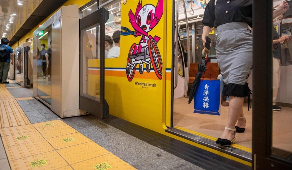 Tenji blocks with QR codes attached are seen inside a train station in Tokyo. Photo: AFP Tenji blocks with QR codes attached are seen inside a train station in Tokyo. Photo: AFP