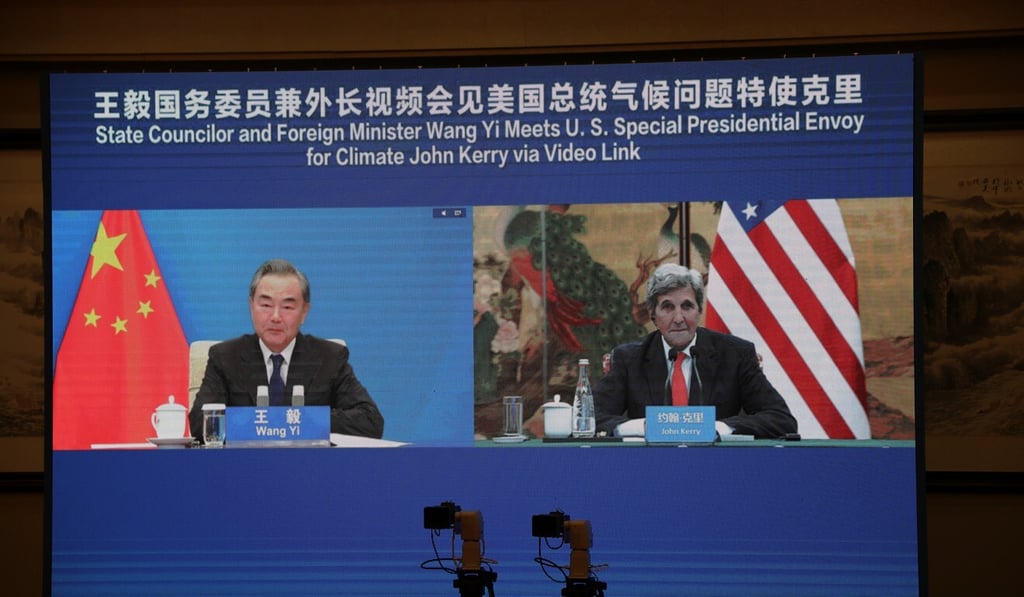 Chinese Foreign Minister Wang Yi and US climate envoy John Kerry during Wednesday’s video call. Photo: Reuters