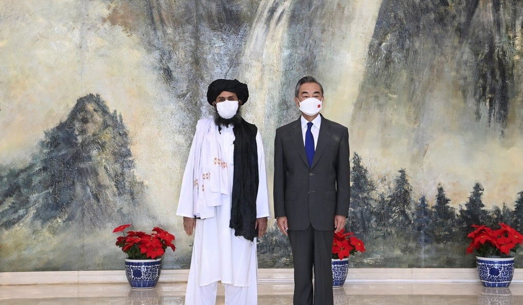 Taliban co-founder Mullah Abdul Ghani Baradar (left) and Chinese Foreign Minister Wang Yi during their meeting in Tianjin, China in July. Photo: AP Taliban co-founder Mullah Abdul Ghani Baradar (left) and Chinese Foreign Minister Wang Yi during their meeting in Tianjin, China in July. Photo: AP