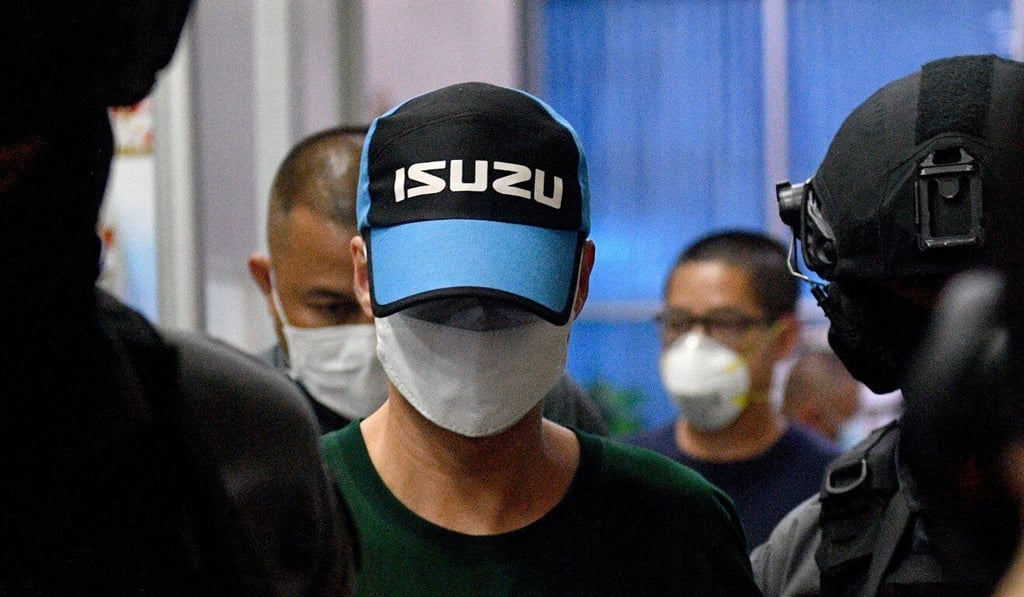 Former police chief Thitisant Uttanapol is detained in Bangkok on August 26. Photo: Reuters