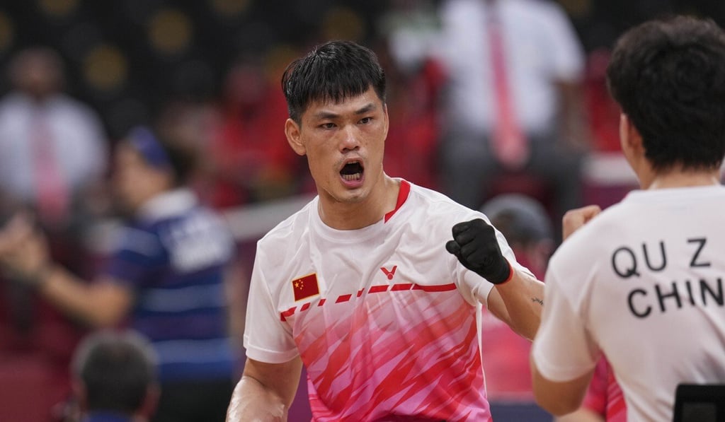 China’s Mai Jianpeng celebrate during the badminton men's doubles WH gold medal match. Photo: Xinhua China’s Mai Jianpeng celebrate during the badminton men's doubles WH gold medal match. Photo: Xinhua