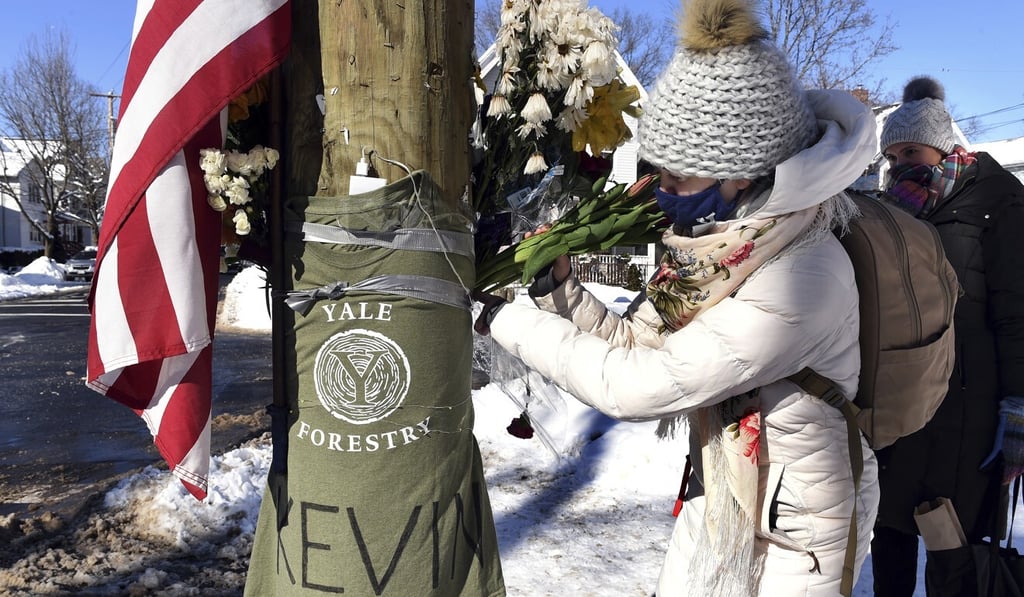 Yale students leave flowers at a memorial for graduate student Kevin Jiang in New Haven, Connecticut, in February, near where he was killed. Photo: Hearst Connecticut Media via AP