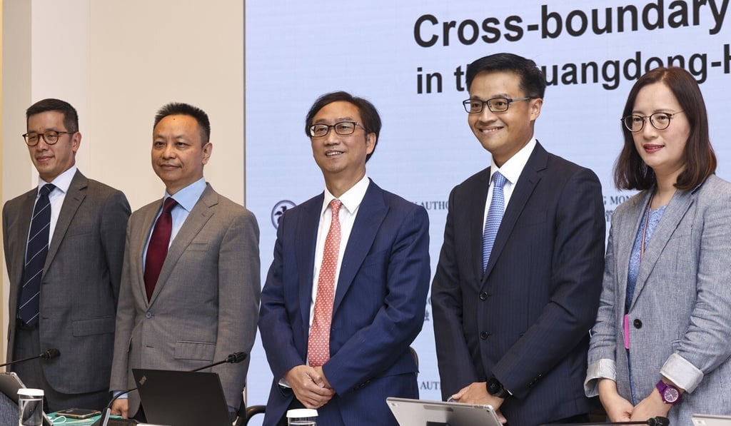 Edmond Lau (centre), deputy chief executive of Hong Kong Monetary Authority and other officials at a press conference on Friday to announce the launch of the Wealth Management Connect. Photo: K.Y. Cheng Edmond Lau (centre), deputy chief executive of Hong Kong Monetary Authority and other officials at a press conference on Friday to announce the launch of the Wealth Management Connect. Photo: K.Y. Cheng