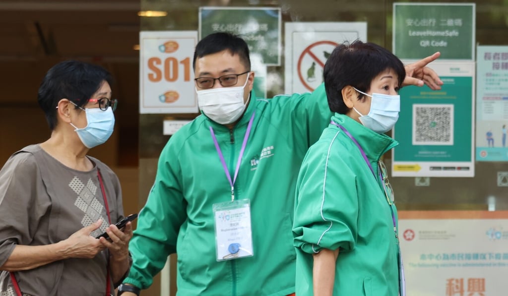 People waiting for coronavirus jabs in August at the Hong Kong Central Library in Causeway Bay. Photo: SCMP / Nora Tam
