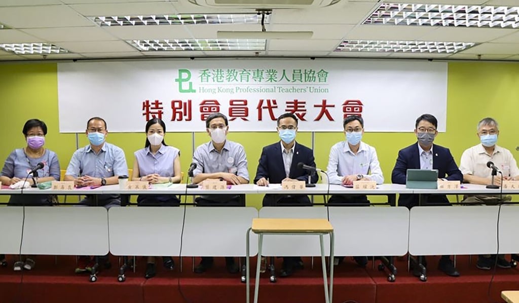 Leaders of the Professional Teachers’€Union hold the special meeting at their Causeway Bay branch on Saturday. Photo: Handout