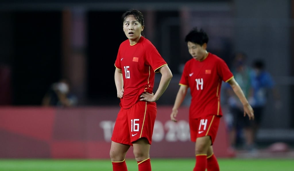 Wang Xiaoxue (left)) and Liu Jingof China look dejected after the Steel Roses lose their opening Tokyo 2020 women’s football match 5-0 to Brazil. Photo: Reuters