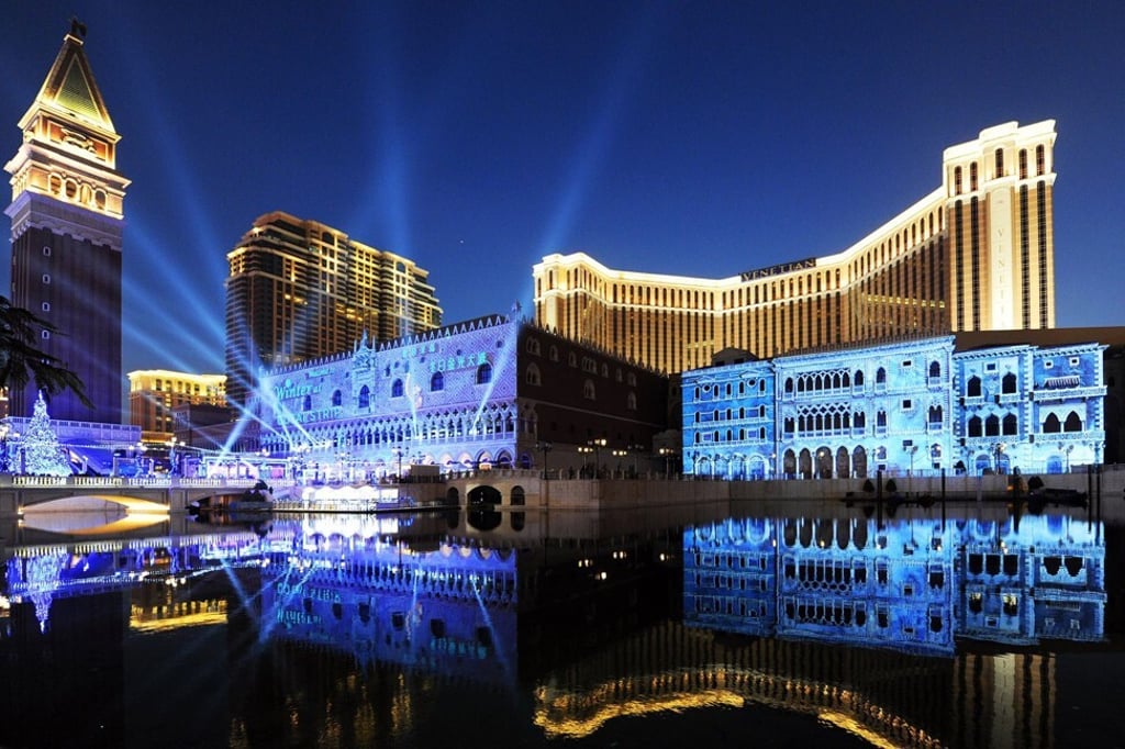 The outdoor lagoon area of The Venetian Macao, owned by Sands China, which also operates The Londoner Macao (first left) and The Parisian Macao (second left). The outdoor lagoon area of The Venetian Macao, owned by Sands China, which also operates The Londoner Macao (first left) and The Parisian Macao (second left).