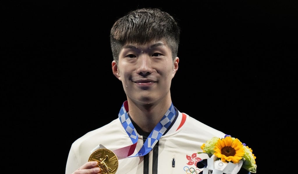 Edgar Cheung Ka-long holds his gold medal during the medal ceremony for the individual foil at the 2020 Olympics. Photo: AP