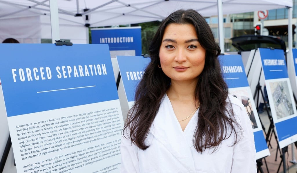 Zumretay Arkin, programme and advocacy manager at the World Uygur Congress, poses at a US-backed photo exhibit in front of the United Nations in Geneva on Thursday. Photo: Reuters Zumretay Arkin, programme and advocacy manager at the World Uygur Congress, poses at a US-backed photo exhibit in front of the United Nations in Geneva on Thursday. Photo: Reuters