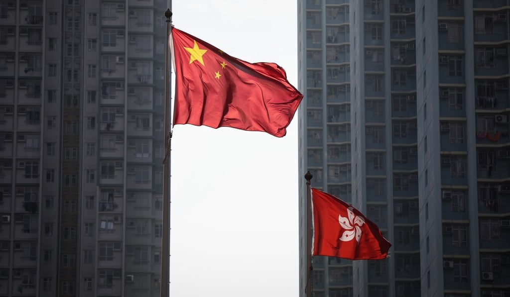 The Chinese and Hong Kong flags outside the West Kowloon courts in Sham Shui Po. Photo: Roy Issa The Chinese and Hong Kong flags outside the West Kowloon courts in Sham Shui Po. Photo: Roy Issa