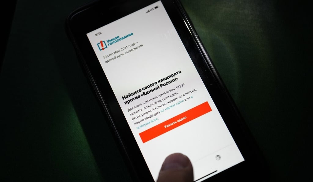 The Smart Voting app is displayed on an iPhone screen in Moscow on Friday. Photo: AP The Smart Voting app is displayed on an iPhone screen in Moscow on Friday. Photo: AP