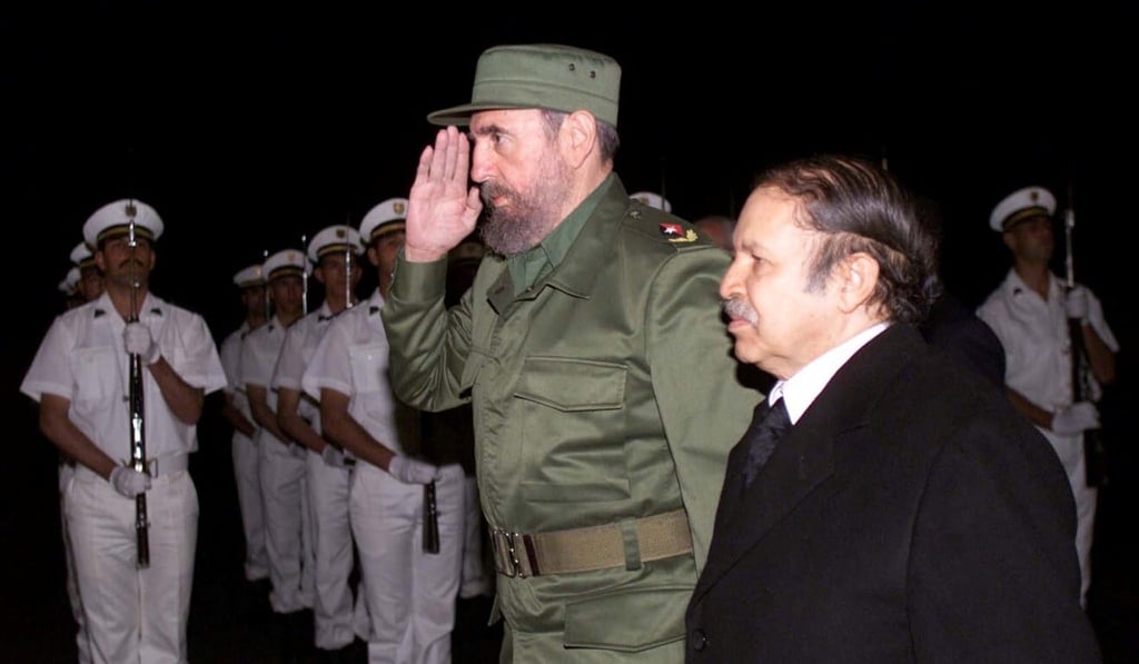 Algerian President Abdelaziz Bouteflika (right) and Cuban leader Fidel Castro review an honour guard in Algiers in 2001. File photo: Reuters Algerian President Abdelaziz Bouteflika (right) and Cuban leader Fidel Castro review an honour guard in Algiers in 2001. File photo: Reuters