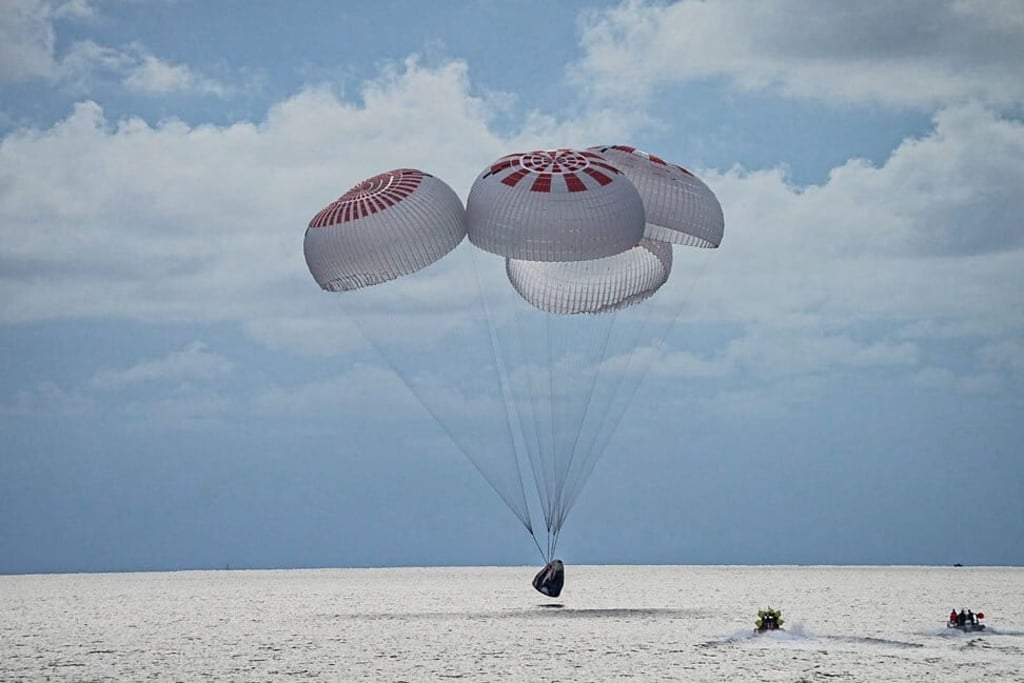 The quartet of newly minted citizen astronauts safely splashes down in SpaceX's Crew Dragon capsule off the coast of Kennedy Space Center. Photo: SpaceX via Reuters