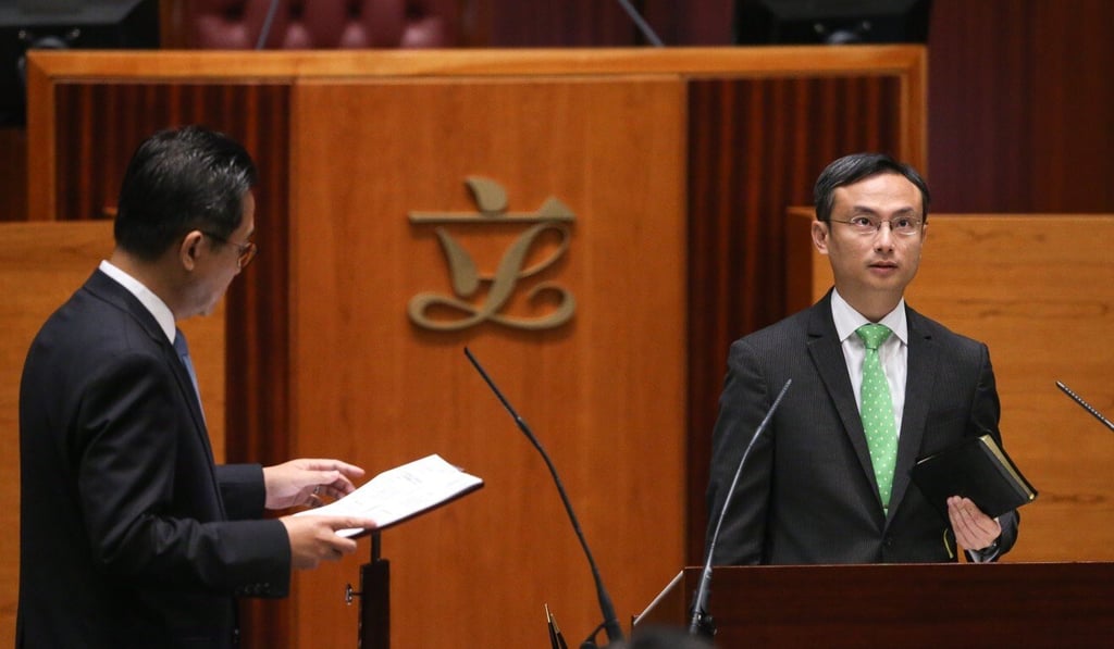 Pierre Chan (right) takes his oath in October 2016. Photo: Sam Tsang