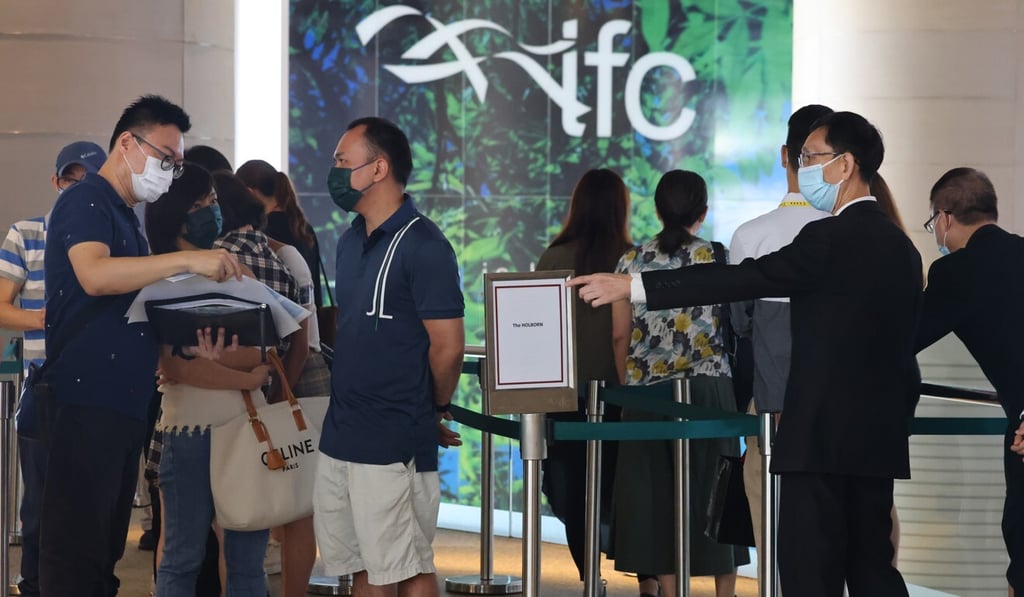 Homebuyers line up for Henderson Land's The Holborn development on Sunday. Photo: Dickson Lee Homebuyers line up for Henderson Land's The Holborn development on Sunday. Photo: Dickson Lee