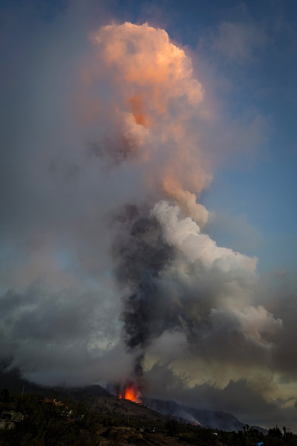 Lava and smoke flow from an eruption of a volcano on the island of La Palma in the Canaries Islands, Spain on Sunday. Photo: AP