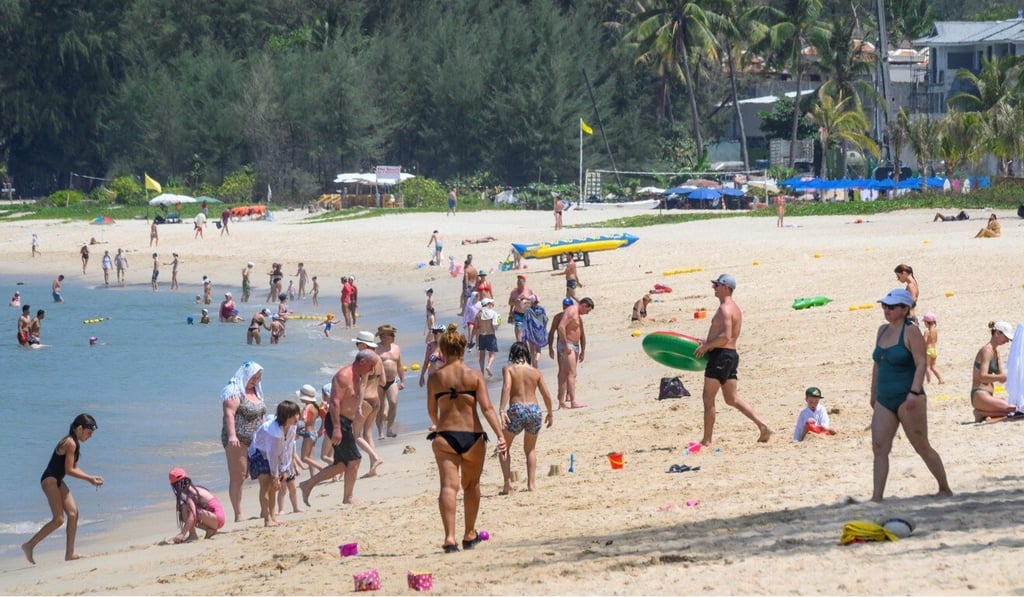 Tourists at a beach resort in Phuket. File photo: AFP
