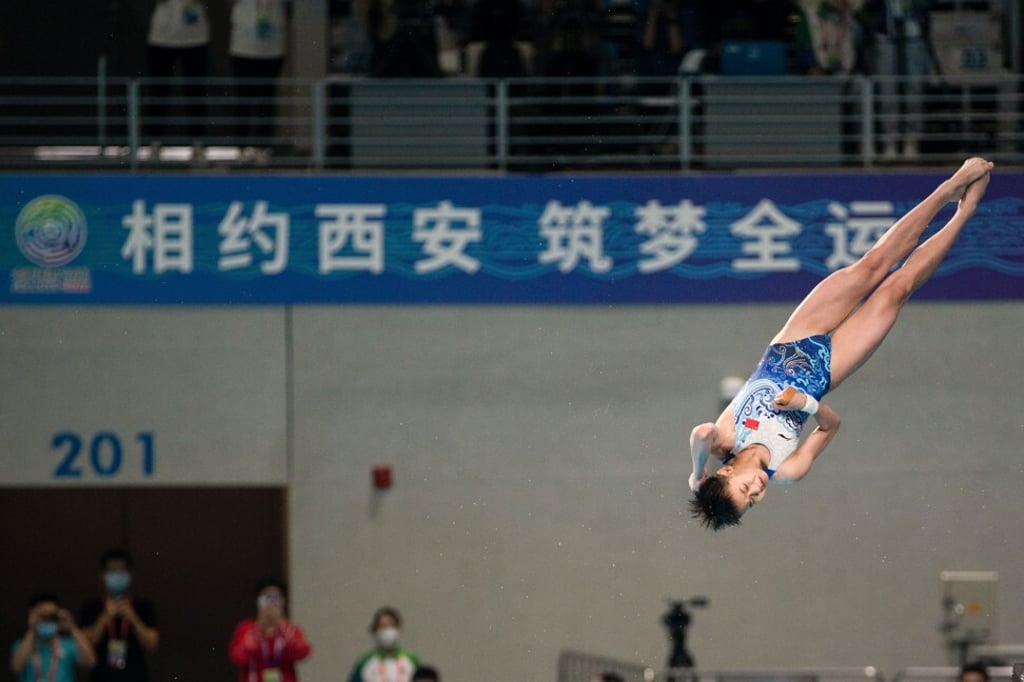 Quan Hongchan of Guangdong competes in the Women’s 10m platform diving event during the 14th National Games of China on September 6, 2021. Photo: Getty Images Quan Hongchan of Guangdong competes in the Women’s 10m platform diving event during the 14th National Games of China on September 6, 2021. Photo: Getty Images