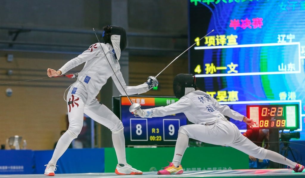 Hong Kong’s Vivian Kong (left) defends against Lin Sheng of Fujian in the women's individual épée event in Tianjin. Photo: Chinese Fencing Association Hong Kong’s Vivian Kong (left) defends against Lin Sheng of Fujian in the women's individual épée event in Tianjin. Photo: Chinese Fencing Association
