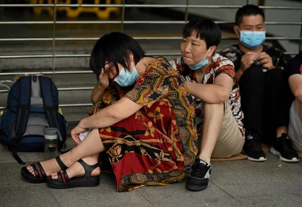 Investors and customers of various wealth management products sold by China Evergrande Group gathered at the company’s headquarters in Shenzhen on September 16, 2021. Photo: AFP.