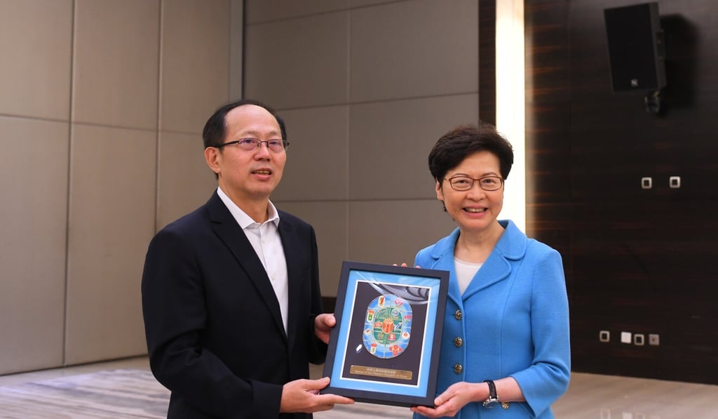 Hong Kong leader Carrie Lam poses with Gou Zhongwen, director of China’s General Administration of Sport, on Sunday in Shaanxi province. Photo: Handout Hong Kong leader Carrie Lam poses with Gou Zhongwen, director of China’s General Administration of Sport, on Sunday in Shaanxi province. Photo: Handout