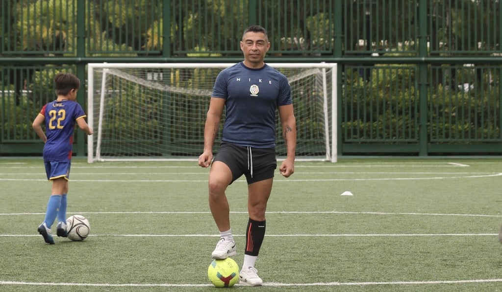 Football coach Oscar Benavides teaches kids in Tung Chung in September. Photo: Xiaomei Chen Football coach Oscar Benavides teaches kids in Tung Chung in September. Photo: Xiaomei Chen