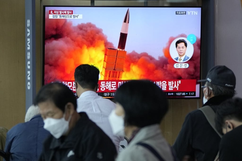A TV report in Seoul shows a file image of a North Korean missile launch. Photo: AP