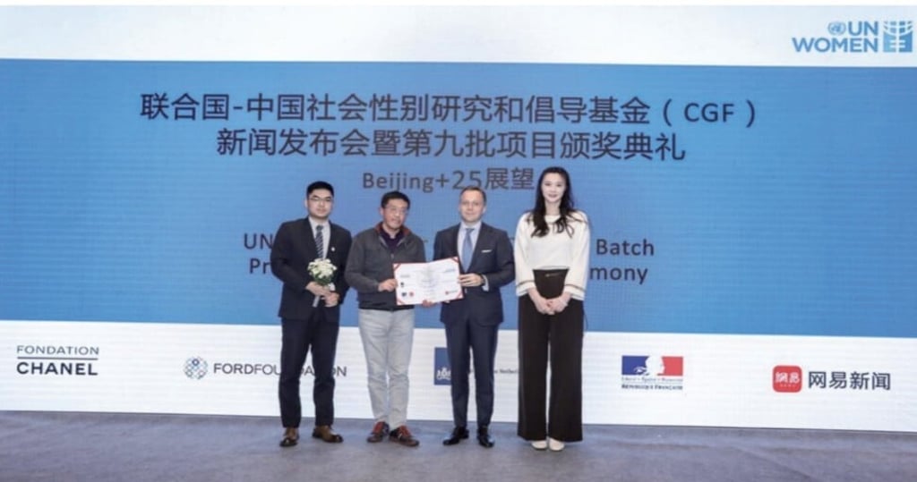 The team behind the gender biases report celebrates its release. Photo: UN Women The team behind the gender biases report celebrates its release. Photo: UN Women