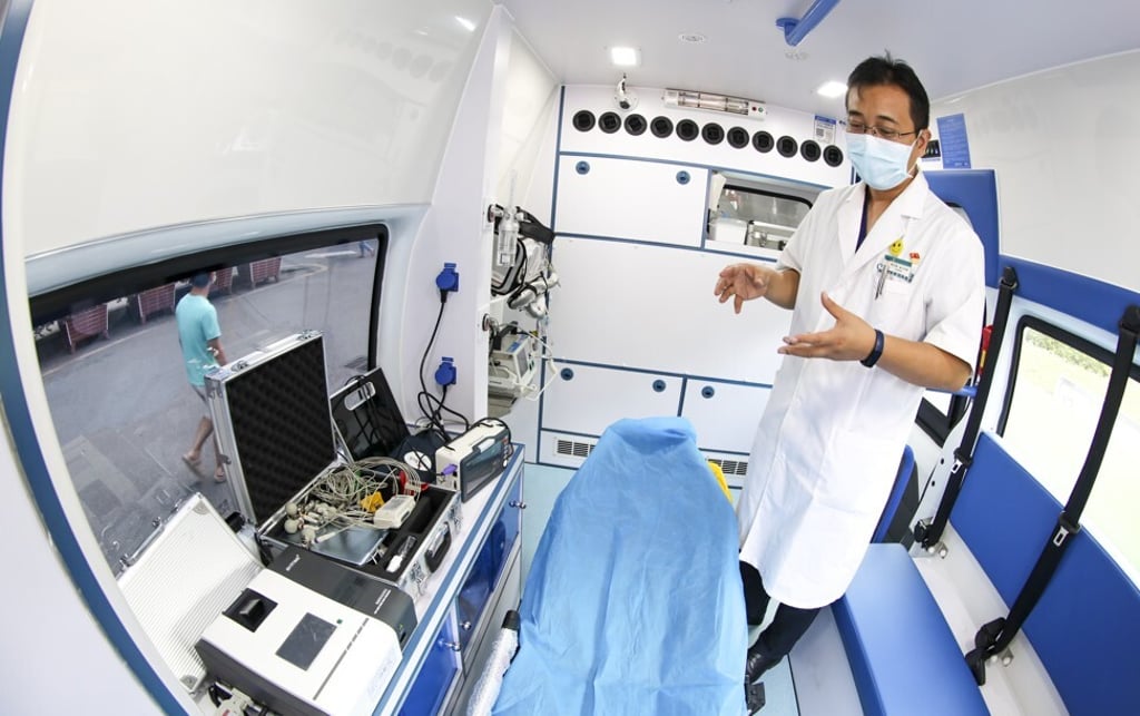 Liu Xingtao, an emergency doctor at Guangdong Second Provincial General Hospital, introduces how ambulances use 5G technologies for real-time communication with the hospital in Guangzhou on September 26. Photo: SCMP/Simon Song Liu Xingtao, an emergency doctor at Guangdong Second Provincial General Hospital, introduces how ambulances use 5G technologies for real-time communication with the hospital in Guangzhou on September 26. Photo: SCMP/Simon Song