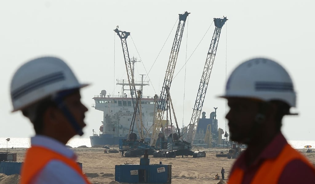 Pumps dredge sand at a Chinese-funded reclamation site next to Colombo’s main seaport in January 2018. Photo: AFP Pumps dredge sand at a Chinese-funded reclamation site next to Colombo’s main seaport in January 2018. Photo: AFP
