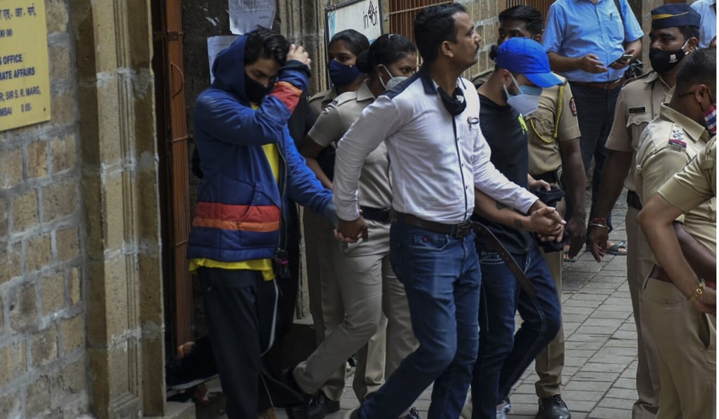 Bollywood actor Shah Rukh Khan’s son Aryan Khan is taken to a court in Mumbai on Monday. Photo: AP Bollywood actor Shah Rukh Khan’s son Aryan Khan is taken to a court in Mumbai on Monday. Photo: AP