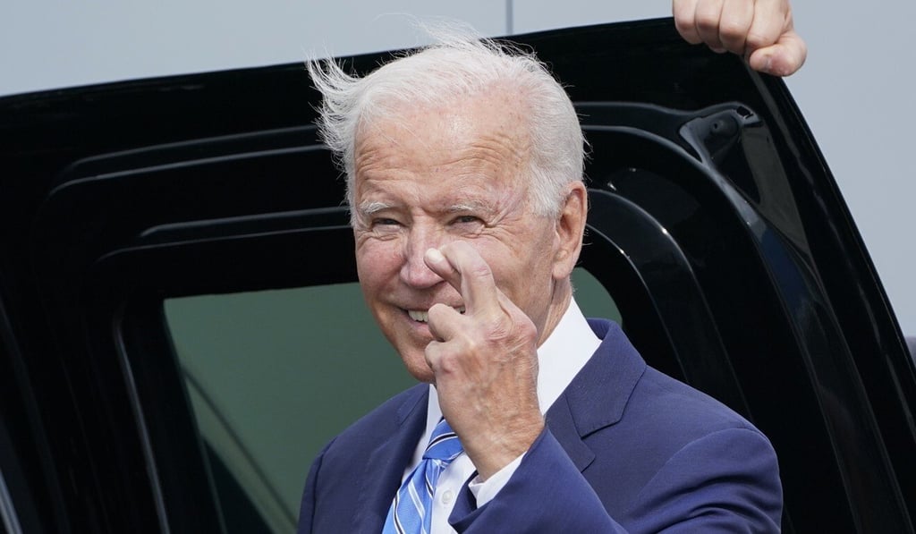 President Joe Biden crosses his fingers as he responds to a question about the short term debt deal on Thursday. Photo: AP President Joe Biden crosses his fingers as he responds to a question about the short term debt deal on Thursday. Photo: AP