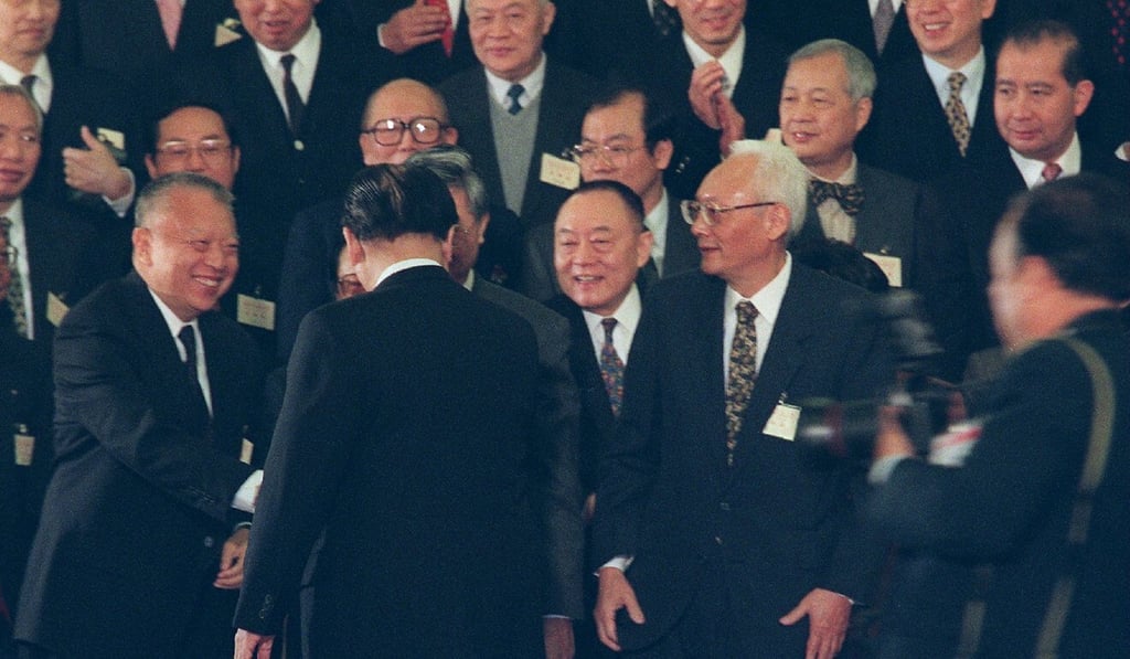 Tung Chee-hwa (left) shakes hands with Jiang Zemin back in 1996. Photo: SCMP